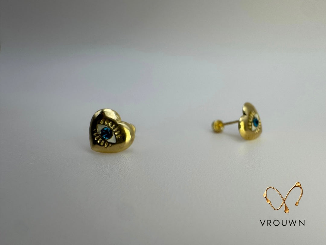 Heart Locking Eye Blue Zircon and Solid 10k Gold